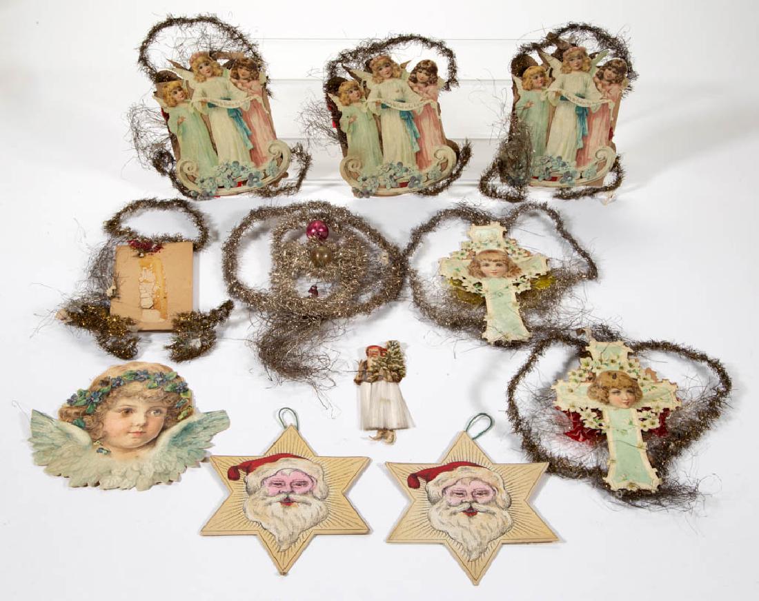 CHRISTMAS / HOLIDAY LITHOGRAPH AND MOLDED PAPER: CHRISTMAS / HOLIDAY LITHOGRAPH AND MOLDED PAPER ORNAMENTS, LOT OF NINE, comprising six examples with tinsel accents and three Santa Claus examples. Five with whole and partial "Patent June, 1898" labe