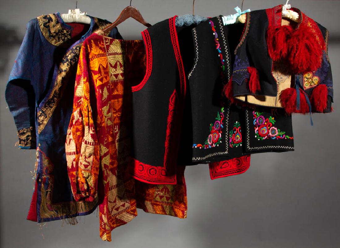 ASSORTED TRADITIONAL / FOLK CLOTHING, LOT OF FIVE: ASSORTED TRADITIONAL / FOLK CLOTHING, LOT OF FIVE, comprising three black vests with colorful accents and two various-styled shirts with multi-colored example having "Made in India" interior label. 20
