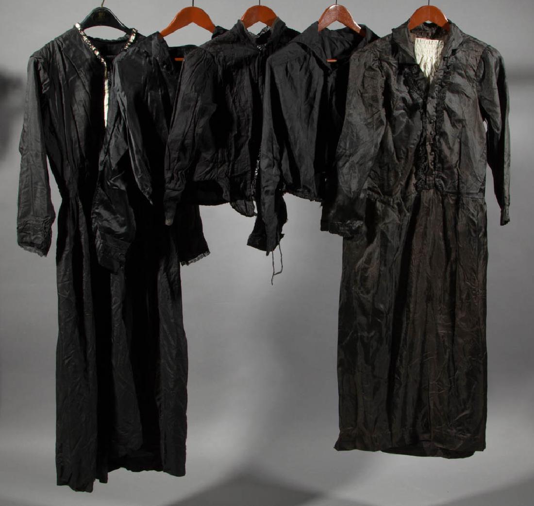 VICTORIAN / EDWARDIAN BLACK CLOTHING, LOT OF FIVE: VICTORIAN / EDWARDIAN BLACK CLOTHING, LOT OF FIVE, comprising two dresses and three shirts in various styles. Late 19th/early 20th century. One dress: 39" bust, 28" waist, 49" LOA. Good to very good o