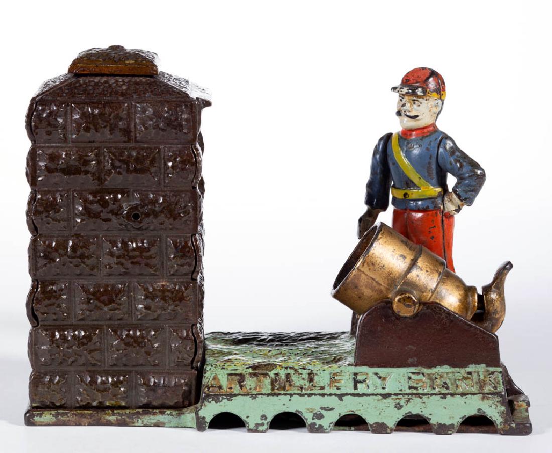 ARTILLERY BANK CAST-IRON MECHANICAL BANK: ARTILLERY BANK CAST-IRON MECHANICAL BANK, blue coat (Union Army), round coin trap, marked "PAT MAY 31 1892" to underside of base. Working condition in original paint. J. & E. Stevens Co., Cromwell, CT