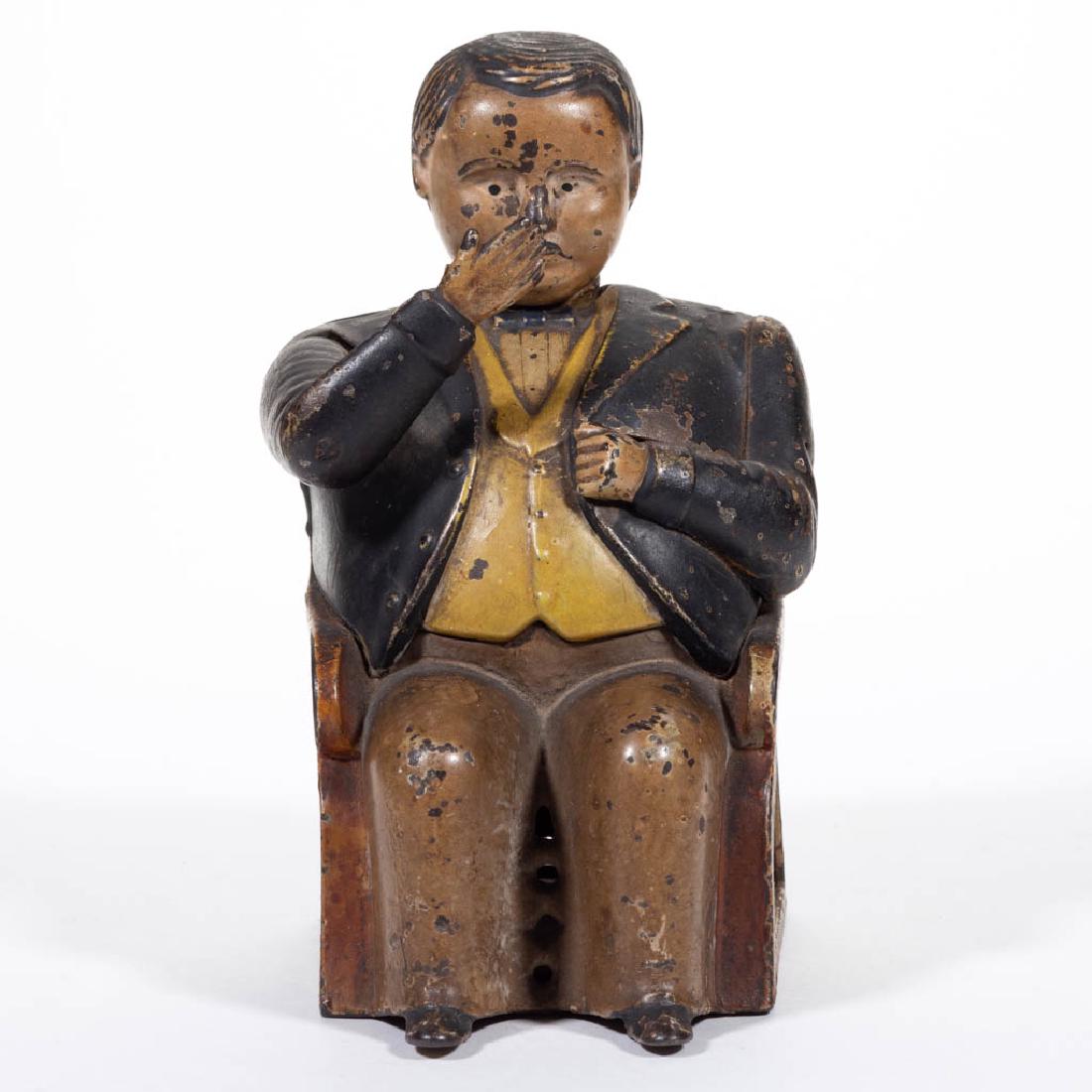 TAMMANY BANK CAST-IRON MECHANICAL BANK: TAMMANY BANK CAST-IRON MECHANICAL BANK, marked with name to each side and "PAT DEC 23 1873" to reverse. Original paint. J & E Stevens Co., Cromwell, CT. Fourth quarter 19th century. 5 3/4" HOA. Good o