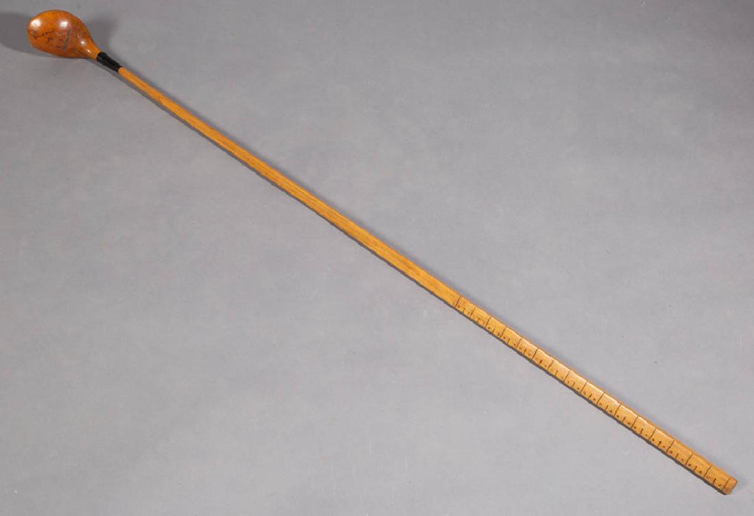 A.G. SPALDING BROS. STORE MEASURE GOLF CLUB: A.G. SPALDING BROS. STORE MEASURE GOLF CLUB, wooden head stamped "1" with metal plate stamped "1060 PAT'D APR.24.1923", with a ruler for shaft measurements for custom built clubs. Retains an old refin