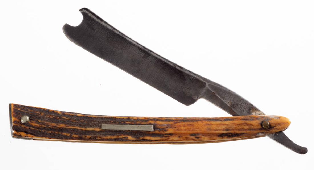 ENGLISH STAG-HANDLED "CHINESE" / STRAIGHT RAZOR: ENGLISH STAG-HANDLED "CHINESE" / STRAIGHT RAZOR, with escutcheon plate, tang stamped with Chinese letters, initials "AK C" etched near wedge pin. Circa 1845. 6 1/4" L. Very good overall condition, min