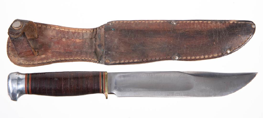 MARBLE'S ARMS & MANUFACTURING CO. IDEAL HUNTING KNIFE: MARBLE'S ARMS & MANUFACTURING CO. IDEAL HUNTING KNIFE, leather-wrapped handle with aluminum pommel, tang marked "Marble's Gladstone, Mich. U.S.A.", including old possibly original leather sheath. Seco