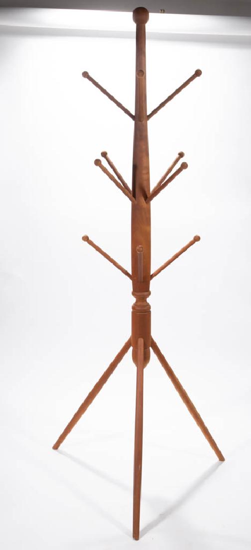 SHAKER-STYLE TURNED CHERRY HAT / COAT RACK: SHAKER-STYLE TURNED CHERRY HAT / COAT RACK, simple turned central shaft with 12 pegs and tripodal base. Second half 20th century. 69 1/2" HOA.Excellent condition.