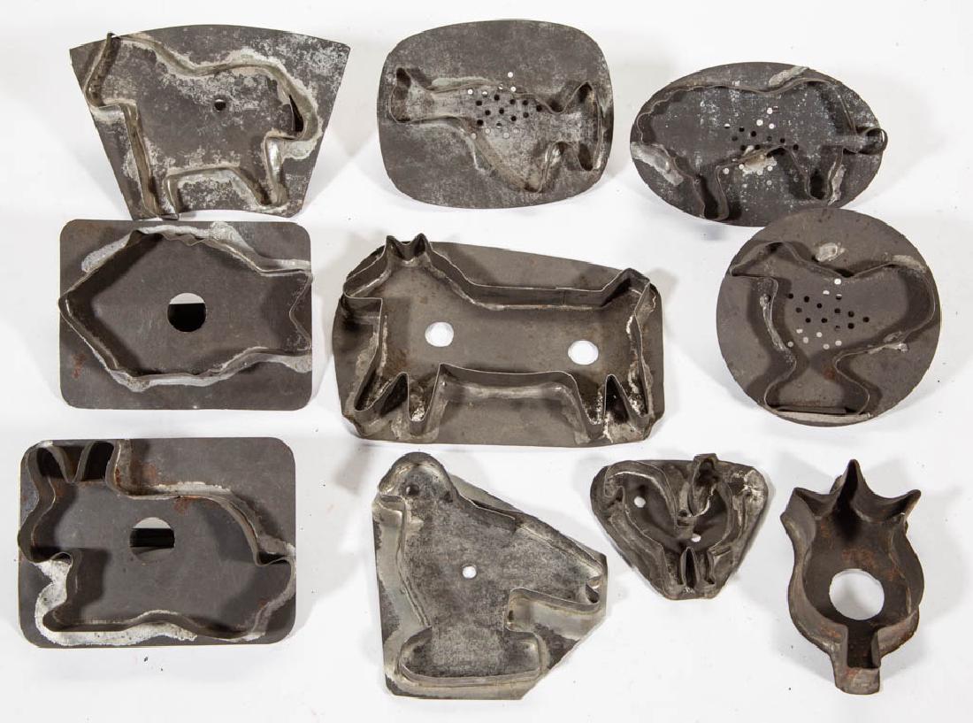 MID-ATLANTIC SHEET-IRON FIGURAL TIN COOKIE CUTTERS, LOT: MID-ATLANTIC SHEET-IRON FIGURAL TIN COOKIE CUTTERS, LOT OF TEN, comprising a dog, rabbit, rooster, duck, chicken, figure of a bird, tulip, lion, horse, and fish, three made without a handle. Second ha