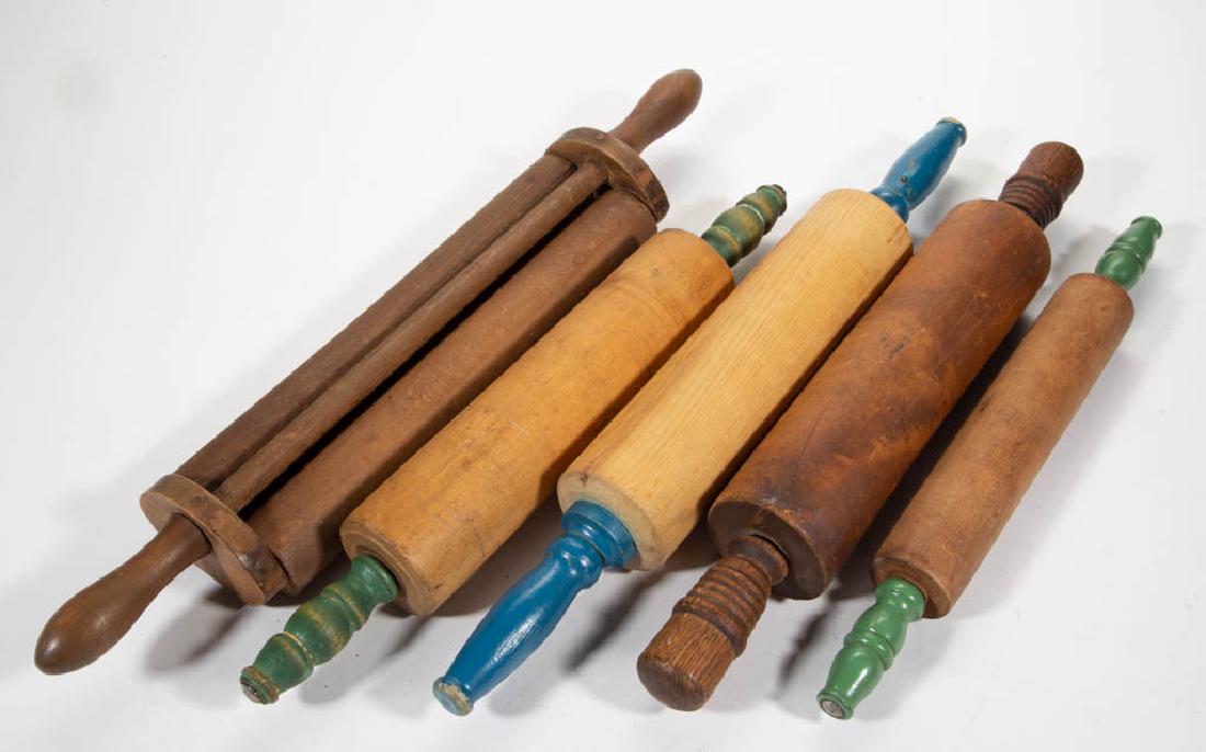 ASSORTED TURNED WOODEN ROLLING PINS, LOT OF FIVE: ASSORTED TURNED WOODEN ROLLING PINS, LOT OF FIVE, including three with painted handles, a double roller example and a carved handle example. Late 19th/first half 20th century. 15" to 20 1/4".Very good