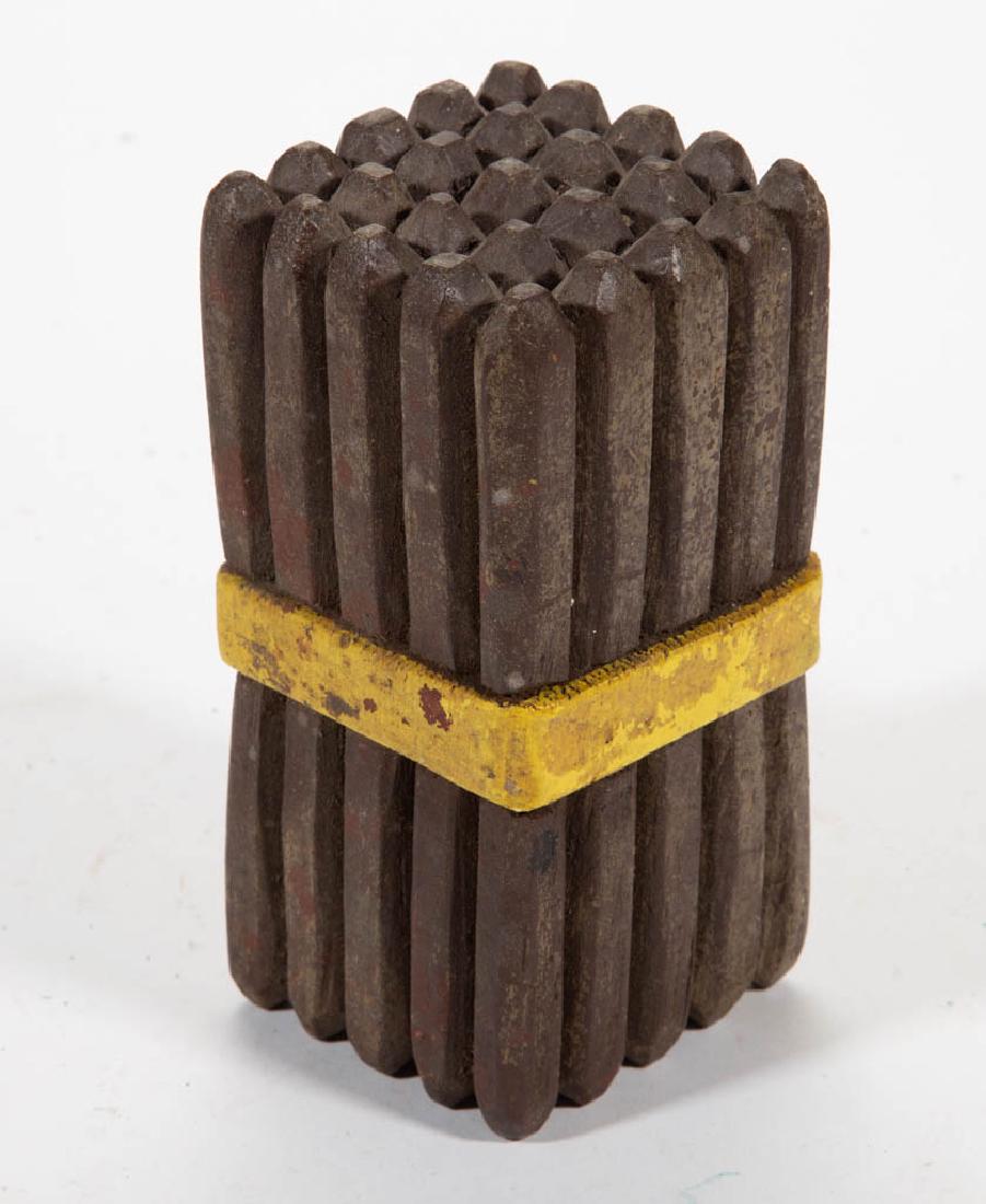 AMERICAN FOLK ART CARVED AND PAINTED CIGAR BUNDLE: AMERICAN FOLK ART CARVED AND PAINTED CIGAR BUNDLE, originally fit in the hand of a Cigar Store Indian. Likely original paint. Late 19th/early 20th century. 6 1/4" H.Very good overall condition, with a