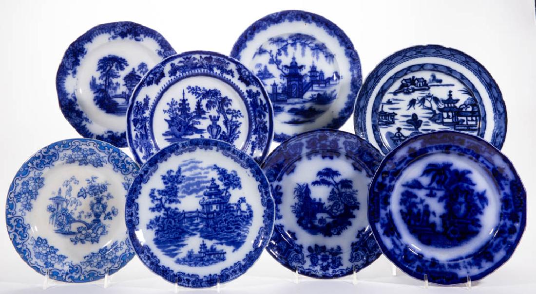 ENGLISH TRANSFER-PRINTED CHINOISERIE MOTIF FLOW BLUE: ENGLISH TRANSFER-PRINTED CHINOISERIE MOTIF FLOW BLUE IRONSTONE CERAMIC PLATES, LOT OF SEVEN, comprising four with scalloped rims, two with panelled rims, and one with a molded border rim, each having 