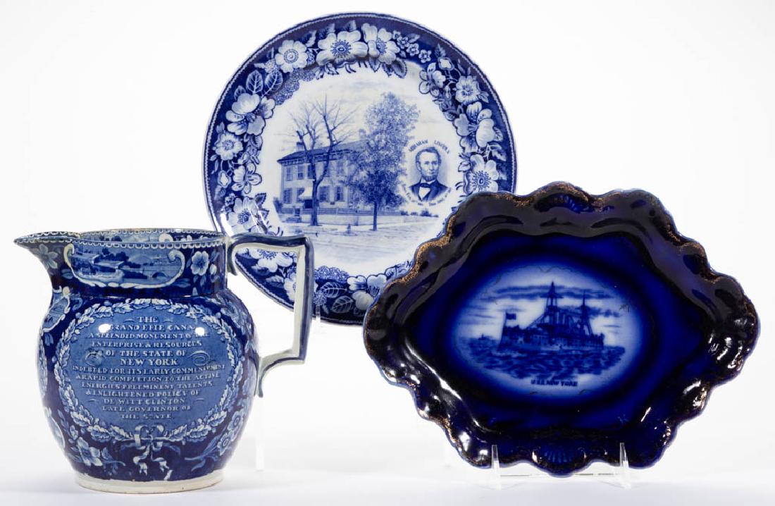 ASSORTED TRANSFER-PRINTED AMERICAN HISTORICAL CERAMIC: ASSORTED TRANSFER-PRINTED AMERICAN HISTORICAL CERAMIC ARTICLES, LOT OF THREE, comprising one 11 1/2" x 8 1/2" scalloped gilded rim tray having a central flow blue "U.S.S. New York" pattern with printe