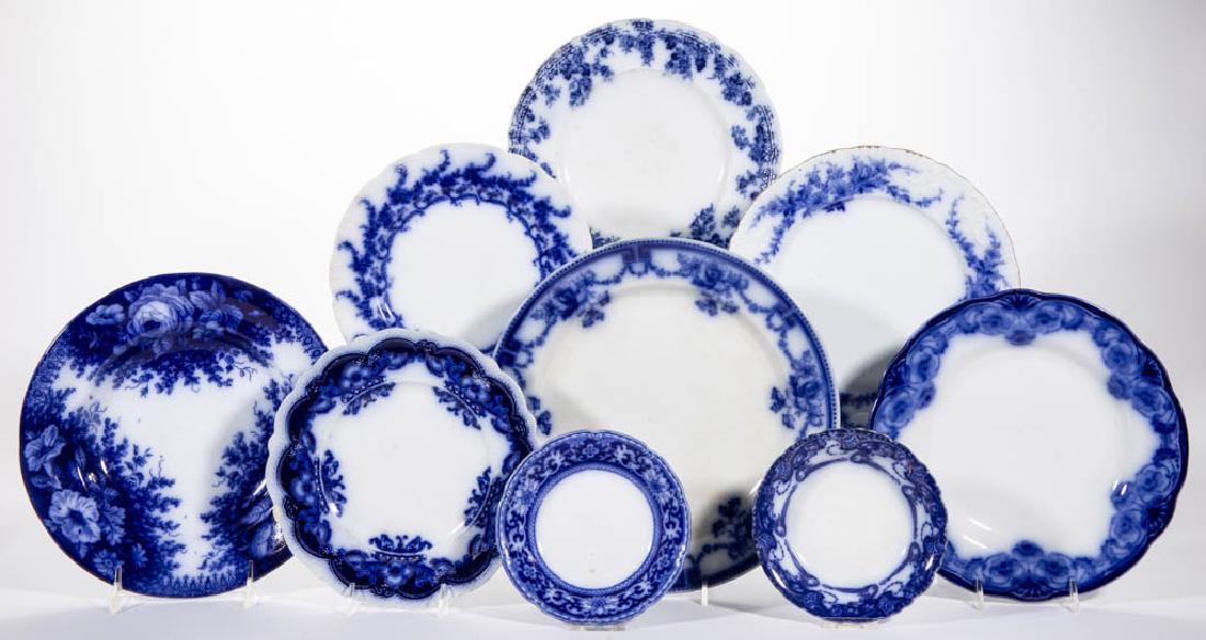 ENGLISH TRANSFER-PRINTED FLORAL BORDER MOTIF FLOW BLUE: ENGLISH TRANSFER-PRINTED FLORAL BORDER MOTIF FLOW BLUE IRONSTONE CERAMIC ARTICLES, LOT OF 15, including two soup plates, three scalloped rim bowls, one with gilded decoration, and ten plates, four hav