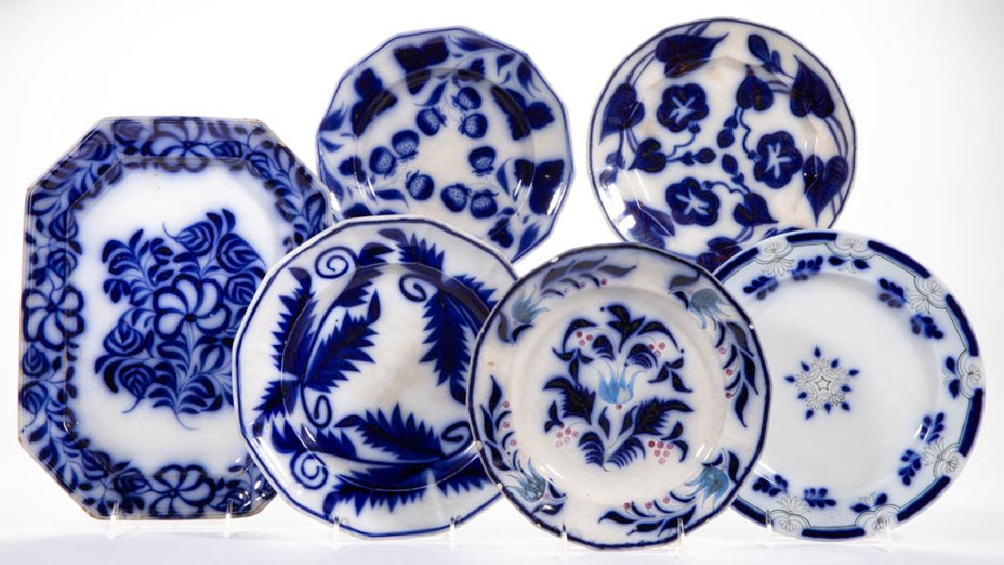 CONTINENTAL BRUSH-STROKE FLOW BLUE CERAMIC ARTICLES,: CONTINENTAL BRUSH-STROKE FLOW BLUE CERAMIC ARTICLES, LOT OF SIX, comprising one 13 1/2" x 10 1/4" platter having a five petal flower and leaf design with impressed stamp "J. Heath", one unscalloped ri