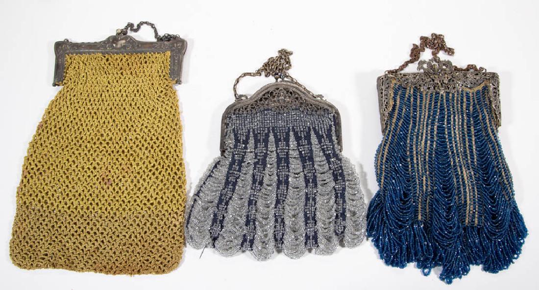 ASSORTED BEADED AND CROCHET LADY'S PURSES, LOT OF THREE: ASSORTED BEADED AND CROCHET LADY'S PURSES, LOT OF THREE, silver-plated frames with chain handle, comprising two examples with filigree, one in blue and gold and other in black and silver having clasp