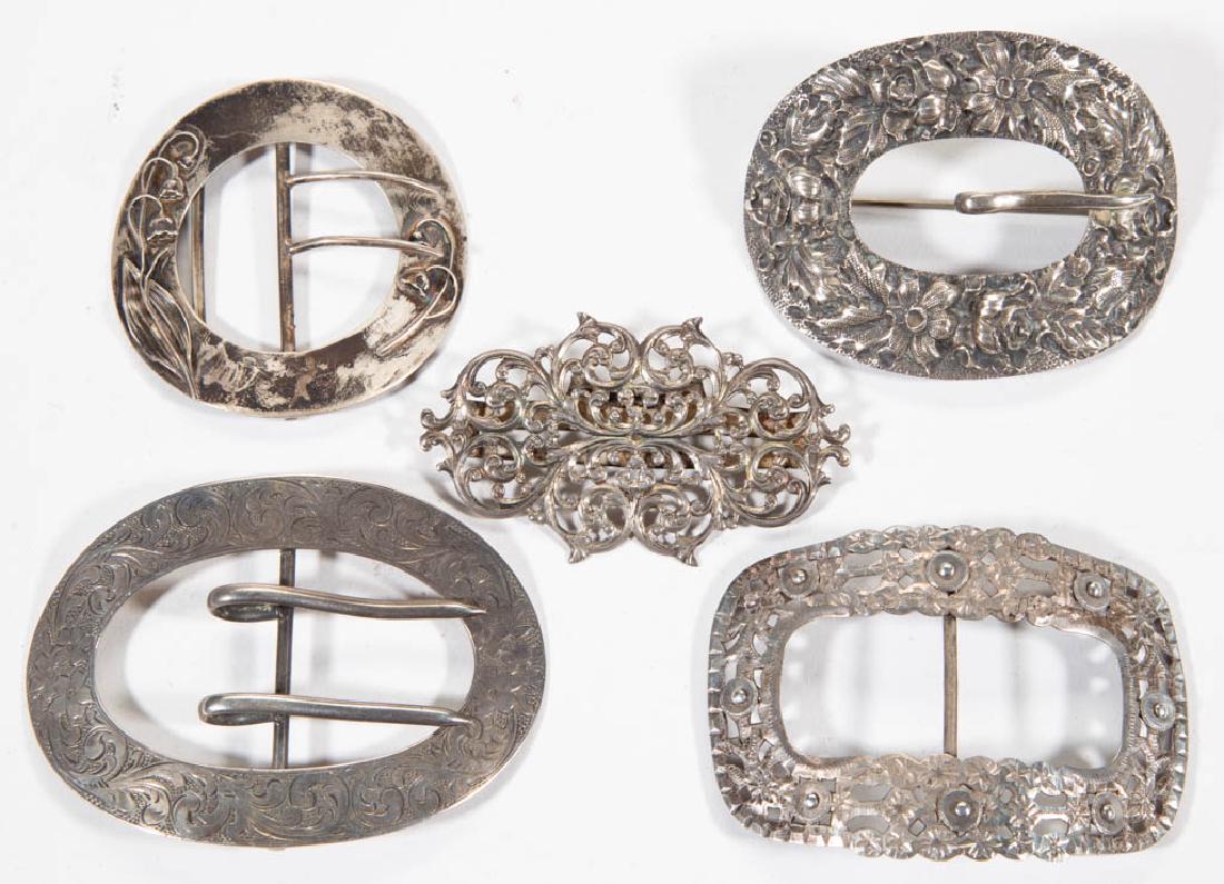 STERLING SILVER CLOTHING / SCARF CLIPS, LOT OF FIVE: STERLING SILVER CLOTHING / SCARF CLIPS, LOT OF FIVE, assorted ovoid forms with engraved and relief patterns, makers include La Pierre, an example with Dutch hallmarks, a Frank Whiting & Co., and Balti
