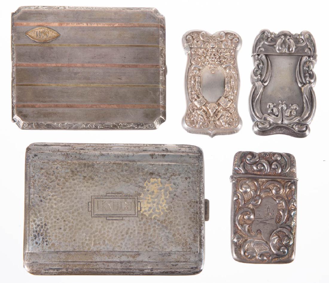 ASSORTED STERLING SILVER CIGARETTE CASES AND MATCH: ASSORTED STERLING SILVER CIGARETTE CASES AND MATCH SAFES, LOT OF FIVE, comprising a case with gilded and copper accents by Elgin American Mfg. Co., a case with hammered accents and gold-washed interio