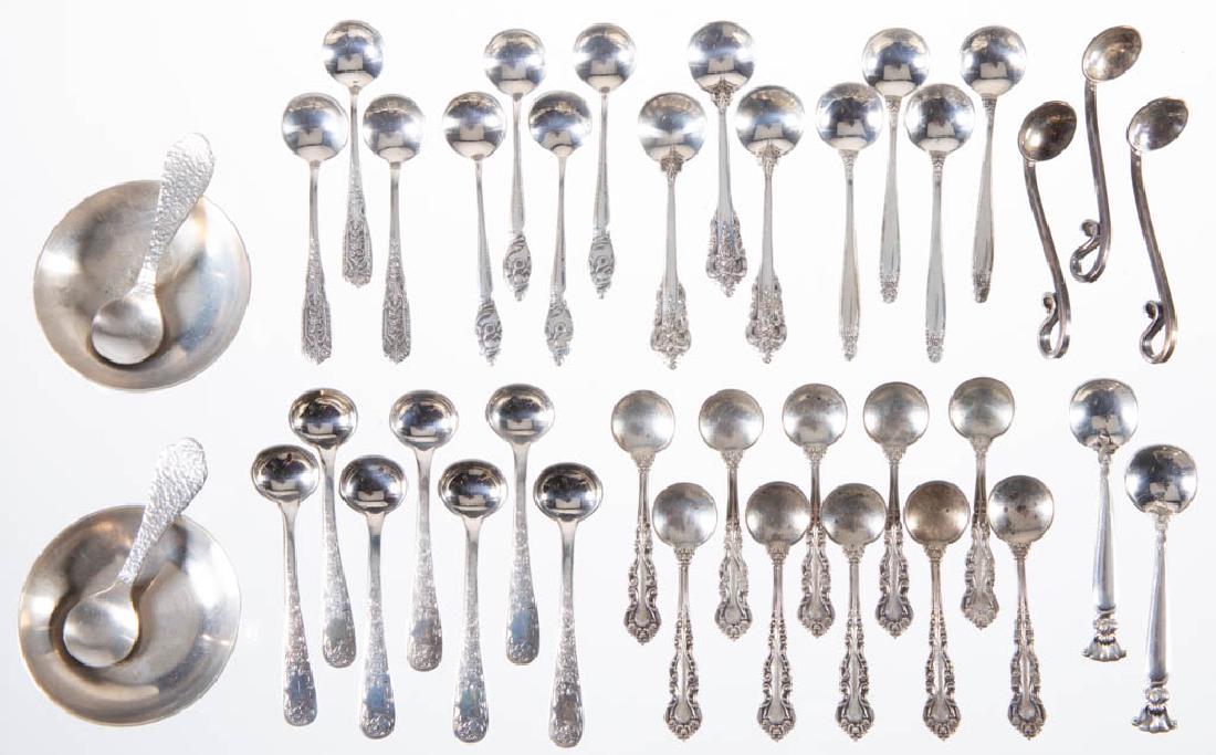 ASSORTED AMERICAN STERLING SILVER SALT SPOONS, LOT OF: ASSORTED AMERICAN STERLING SILVER SALT SPOONS, LOT OF 38, manufacturers including S. Kirk & Son, Westmoreland Sterling Co., Wallace Silversmiths, and International Silver Co. Each with "STERLING" mark