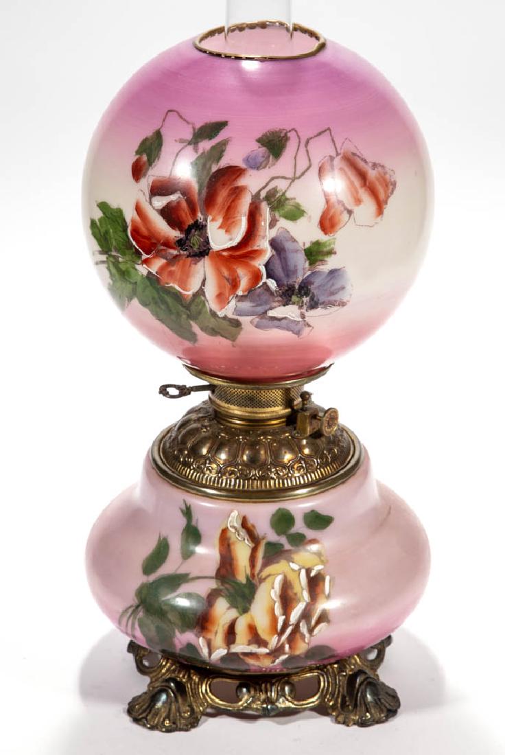 VICTORIAN ENAMEL-DECORATED PARLOR / GONE WITH THE WIND: VICTORIAN ENAMEL-DECORATED PARLOR / GONE WITH THE WIND LAMP, opaque white with pink ground, polychrome and floral stencil decoration, matching decorated ball-form shade with brighter pink ground and b