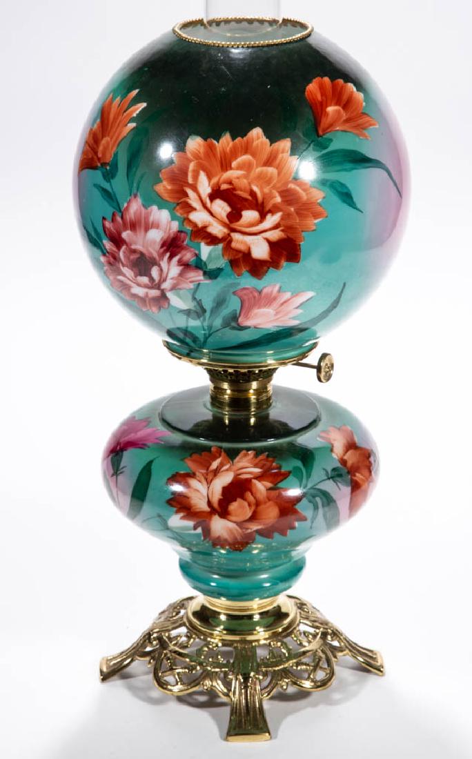 VICTORIAN ENAMEL-DECORATED PARLOR / GONE WITH THE WIND: VICTORIAN ENAMEL-DECORATED PARLOR / GONE WITH THE WIND LAMP, opaque white with olive green and pink shading, polychrome floral decoration, matching decorated ball-form shade with brass heat ring; comp