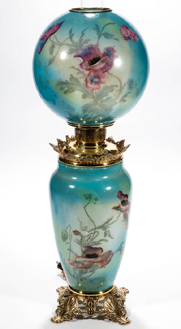 VICTORIAN ENAMEL-DECORATED PARLOR / GONE WITH THE WIND: VICTORIAN ENAMEL-DECORATED PARLOR / GONE WITH THE WIND LAMP, opaque white with blue ground, polychrome moss rose stencil decoration, matching decorated ball-form shade with brass heat ring; elongated-