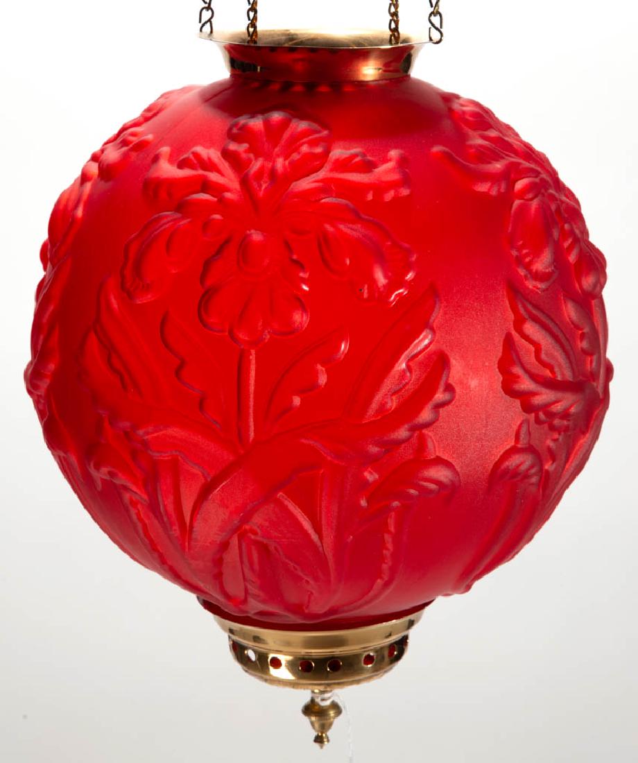 PITTSBURGH REGAL IRIS KEROSENE HALL LAMP: PITTSBURGH REGAL IRIS KEROSENE HALL LAMP, ruby satin, ball form, brass mount, end cap, and motor cover. Electrified. Pittsburgh, Lamp, Brass & Glass Co. Early 20th century. 8" H shade, 4 1/2" D fitter