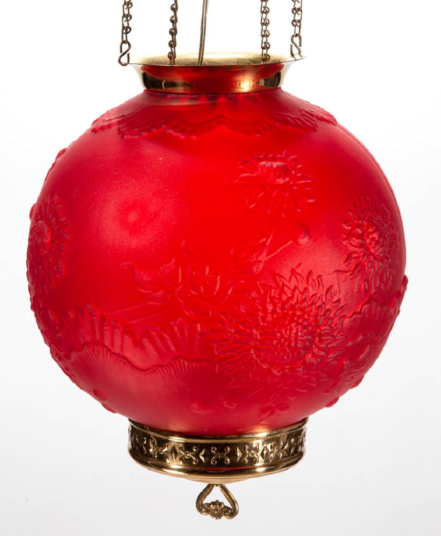 PITTSBURGH CHRYSANTHEMUM SATIN GLASS KEROSENE HALL LAMP: PITTSBURGH CHRYSANTHEMUM SATIN GLASS KEROSENE HALL LAMP, ruby satin, spherical form, brass mount, end cap, and motor cover. Pittsburgh Lamp, Brass & Glass Co. Early 20th century. 8 1/2" H shade, 4 1/2