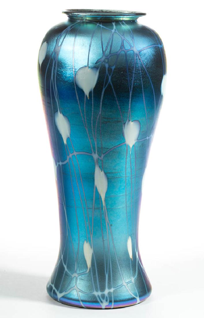 DURAND ATTRIBUTED HEART AND VINE ART GLASS VASE: DURAND ATTRIBUTED HEART AND VINE ART GLASS VASE, blue iridescent with opal hearts and vines, polished pontil mark. Vineland Flint Glass Works. Circa 1930. 12 1/2" H, 3 3/4" D rim.Very good condition o