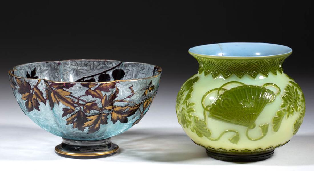 ASSORTED FRENCH ACID-ETCHED / CAMEO ART GLASS ARTICLES,: ASSORTED FRENCH ACID-ETCHED / CAMEO ART GLASS ARTICLES, LOT OF TWO, comprising an amethyst to pale blue acid-etched bowl with lily-of-the-valley decoration and applied foot, and a signed Thomas Webb g