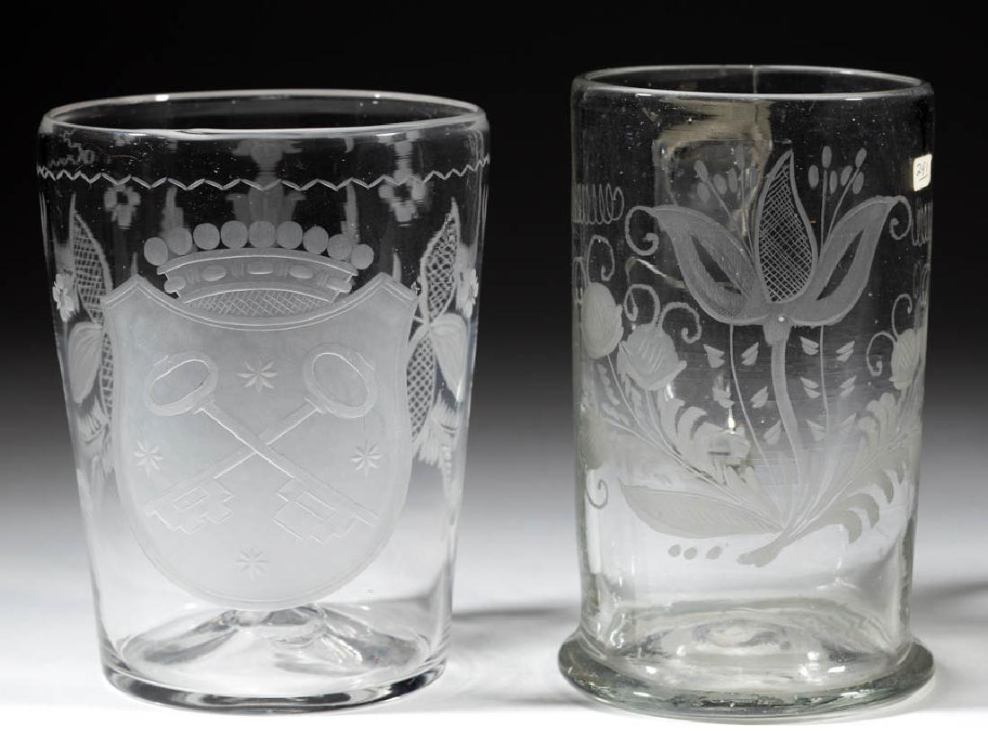 FREE-BLOWN AND ENGRAVED STIEGEL-TYPE GLASS FLIP GLASS: FREE-BLOWN AND ENGRAVED STIEGEL-TYPE GLASS FLIP GLASS, colorless, slightly tapered cylindrical form with a central shield enclosing crossed keys, stylized floral bouquet to the reverse, rough pontil m