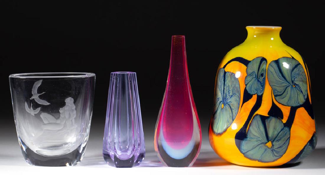 ASSORTED STUDIO ART GLASS VASES, LOT OF FOUR: ASSORTED STUDIO ART GLASS VASES, LOT OF FOUR, comprising a colorless engraved Orrefors, a hexagonal blue signed Moser, an unsigned cased single-flower, and a signed George Thiewes green mottled floral