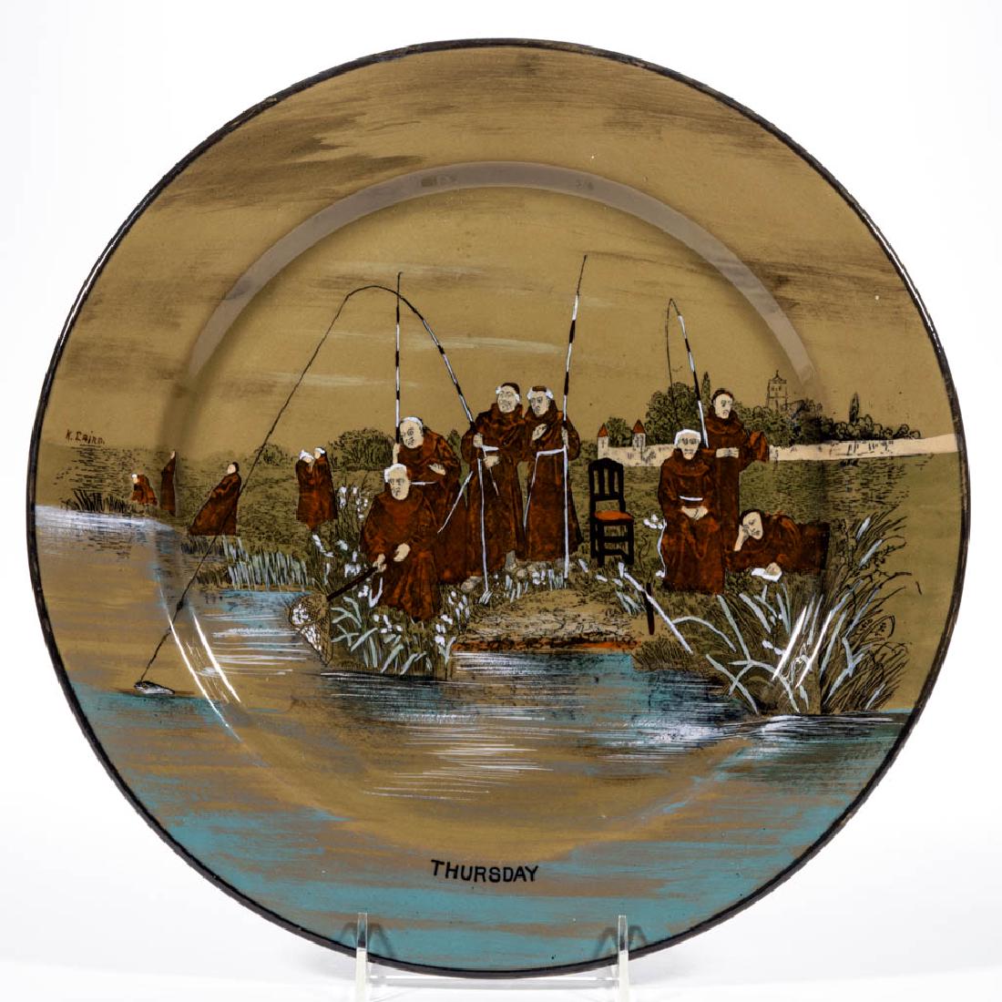 AMERICAN BUFFALO POTTERY DELDARE "THURSDAY" CERAMIC: AMERICAN BUFFALO POTTERY DELDARE "THURSDAY" CERAMIC PLAQUE, having image of friars in brown robes fishing, one having an actual fish on the line, and "THURSDAY" printed at bottom, with two drilled hol