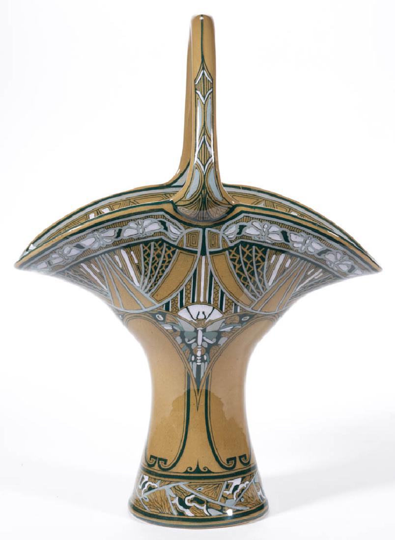 AMERICAN BUFFALO POTTERY DELDARE CERAMIC BASKET: AMERICAN BUFFALO POTTERY DELDARE CERAMIC BASKET, with Art Nouveau-style decoration featuring dragonflies, butterflies, and geometric motifs. Printed mark "MADE AT / YE / 1909 / BUFFALO / POTTERY / DEL