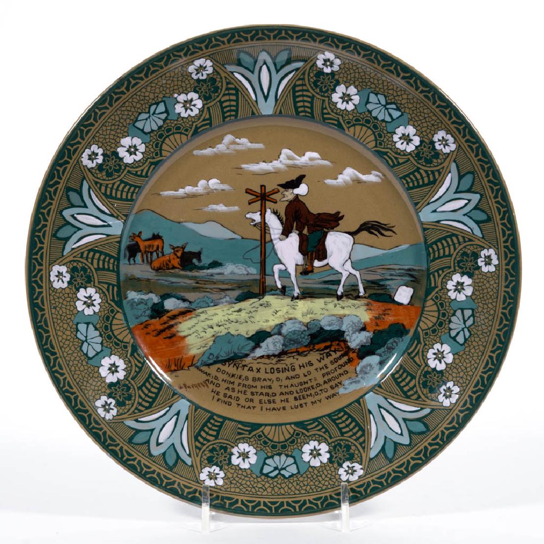 AMERICAN BUFFALO POTTERY EMERALD DELDARE DR. SYNTAX: AMERICAN BUFFALO POTTERY EMERALD DELDARE DR. SYNTAX CERAMIC PLATE, having scene "Dr Syntax Losing His Way", with decorator signature. Green printed mark on base "1911 / BUFFALO / POTTERY / EMERALD / D