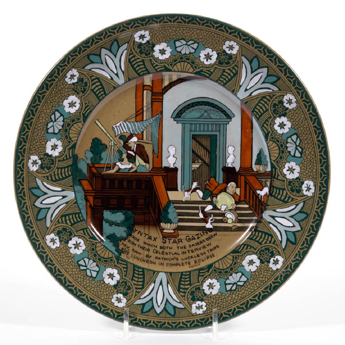 AMERICAN BUFFALO POTTERY EMERALD DELDARE DR. SYNTAX: AMERICAN BUFFALO POTTERY EMERALD DELDARE DR. SYNTAX CERAMIC PLATE, having scene "Syntax Star Gazing", signed "M.[abel] Gerhardt". Green printed mark on base "1911 / BUFFALO / POTTERY / EMERALD / DELDA