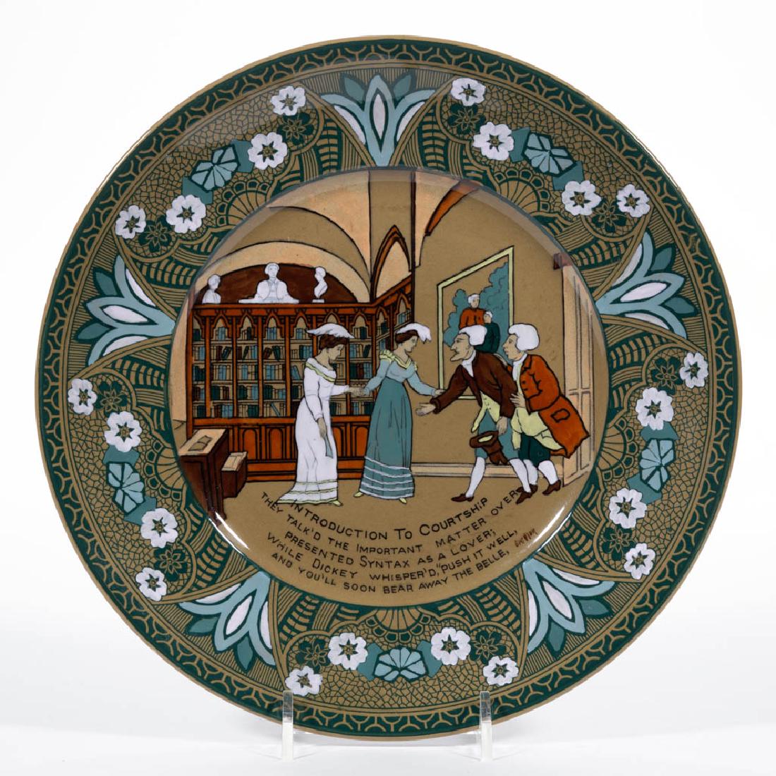 AMERICAN BUFFALO POTTERY EMERALD DELDARE DR. SYNTAX: AMERICAN BUFFALO POTTERY EMERALD DELDARE DR. SYNTAX CERAMIC PLATE, having scene "Introduction To Courtship", signed "B. Wilton". Green printed mark on base "1911 / BUFFALO / POTTERY / EMERALD / DELDAR