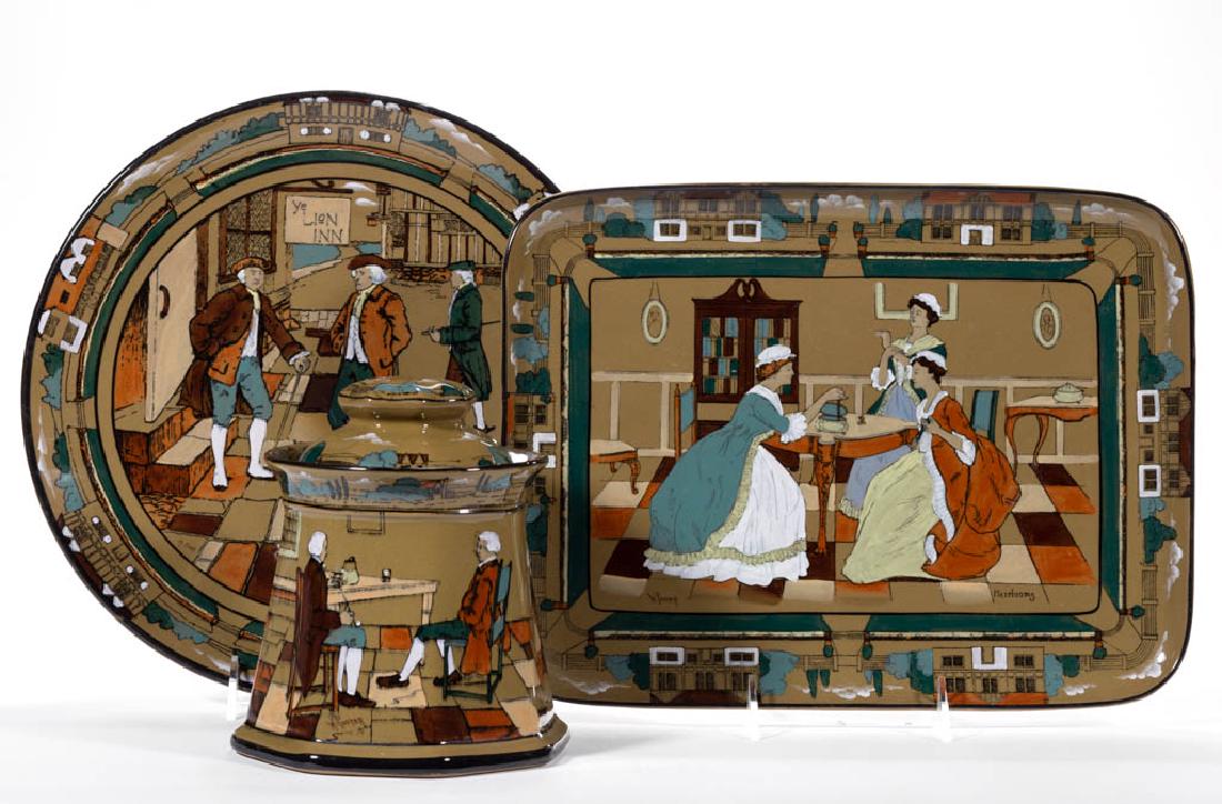 AMERICAN BUFFALO POTTERY DELDARE "YE OLDEN DAYS": AMERICAN BUFFALO POTTERY DELDARE "YE OLDEN DAYS" CERAMIC ARTICLES, LOT OF THREE, comprising a tea tray with image of ladies examining jewelry around a table, entitled "Heirlooms", and signed "W. Foste