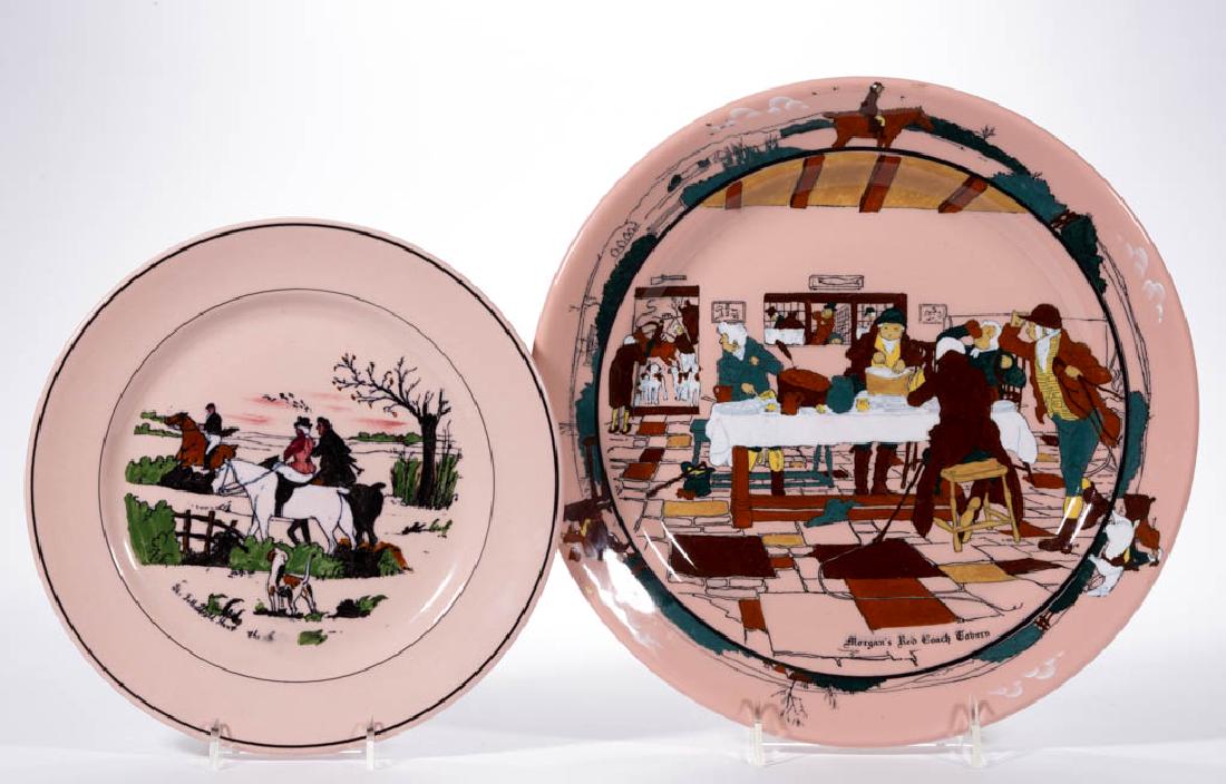AMERICAN BUFFALO POTTERY "THE FALLOWFIELD HUNT" ROUGE: AMERICAN BUFFALO POTTERY "THE FALLOWFIELD HUNT" ROUGE WARE CERAMIC PLATES, LOT OF TWO, comprising a plate having scene "Morgan's Red Coach Tavern" depicting men eating breakfast with border of riders