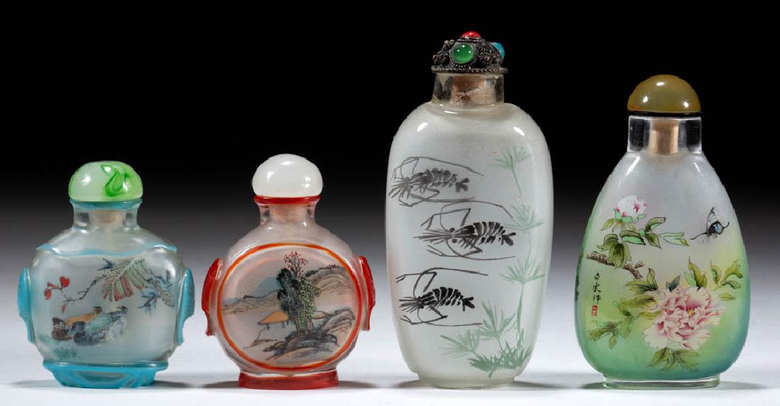 CHINESE REVERSE PAINTED GLASS SNUFF BOTTLES, LOT OF: CHINESE REVERSE PAINTED GLASS SNUFF BOTTLES, LOT OF FOUR, having polychrome designs including shrimp, structures with trees, ducks and waterfalls, and butterfly and peony, each with cap. Unmarked. Pro