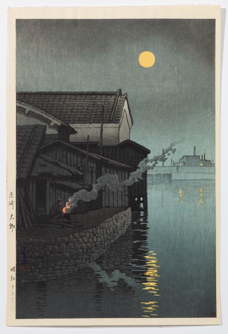 KAWASE HASUI (JAPANESE, 1883-1957) WOODBLOCK PRINT: KAWASE HASUI (JAPANESE, 1883-1957) WOODBLOCK PRINT, "Daimotsu Bay in Amagasaki", depicting a figure sitting next to a fire along the water's edge, Hasai signature and red Kawase seal in lower left edg