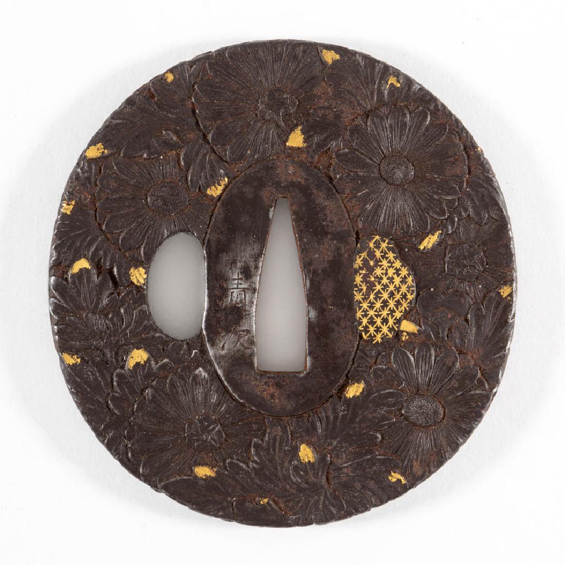 JAPANESE EDO PERIOD IRON TSUBA: JAPANESE EDO PERIOD IRON TSUBA, possibly Sunagawa work with Choshu feeling, each side having open chrysanthemum blooms featuring gilded dew drops on the leaves, featuring an open kozuka hitsu-ana and 