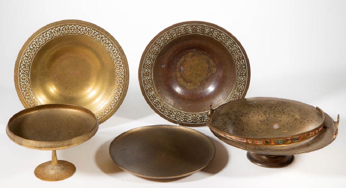 TIFFANY STUDIOS BRONZE ARTICLES, LOT OF FIVE: TIFFANY STUDIOS BRONZE ARTICLES, LOT OF FIVE, including two bowls with patterned bands to the edge, a compote with a Greek Key design to the exterior of the rim, and a handled bowl with enameling to t