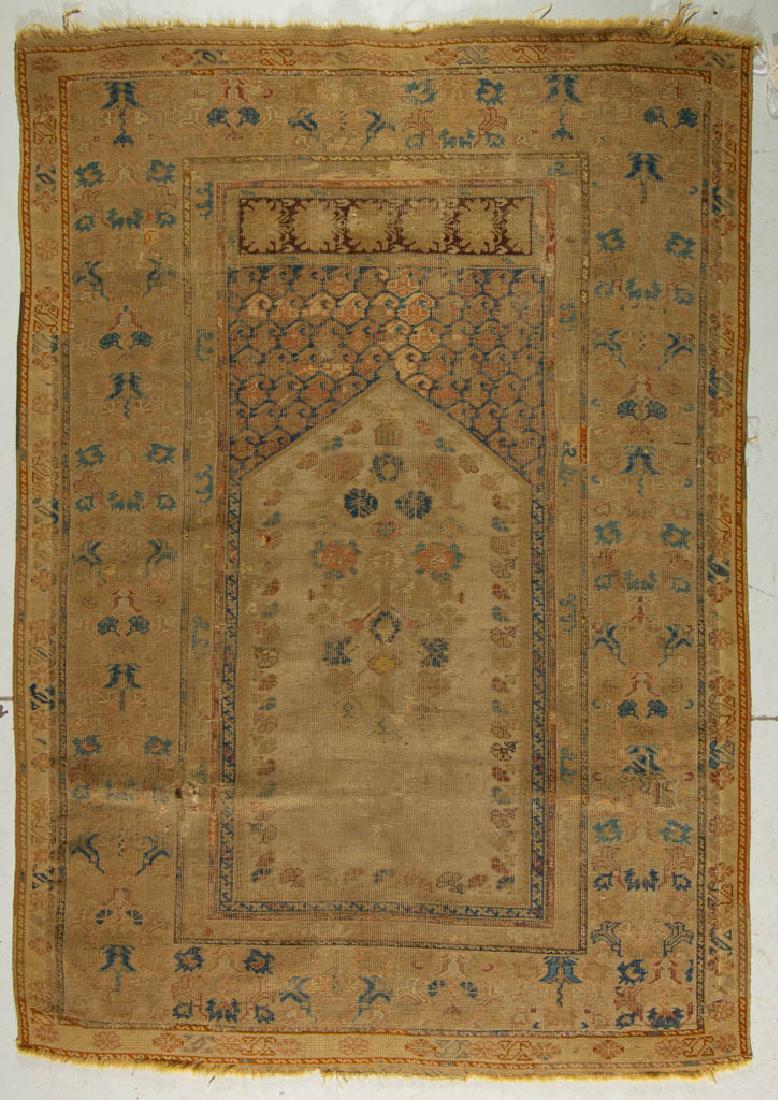 ANTIQUE GHIORDES PRAYER RUG: ANTIQUE GHIORDES PRAYER RUG, center with tree of life, border with floral and geometric designs. 19th century. 3' 11" x 5' 6".Good overall condition, old repairs, with moderate to heavy signs of usage