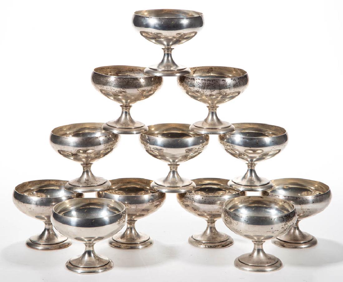 R. WALLACE & SONS STERLING SILVER CHAMPAGNE COUPES /: R. WALLACE & SONS STERLING SILVER CHAMPAGNE COUPES / SHERBETS, SET OF 12, each having a shallow rounded well on a pedestal-type base. Each with impressed "RW &S / 2331 / STERLING" mark to base. Total 