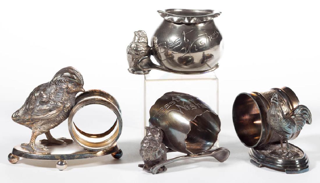 MERIDEN BRITANNIA CO. AND OTHER CHICKEN FIGURAL: MERIDEN BRITANNIA CO. AND OTHER CHICKEN FIGURAL SILVER-PLATED NAPKIN RINGS AND TOOTHPICK HOLDER, LOT OF FOUR, comprising a "222" large chick napkin ring by Meriden Britannia Co., a "11" rooster napkin