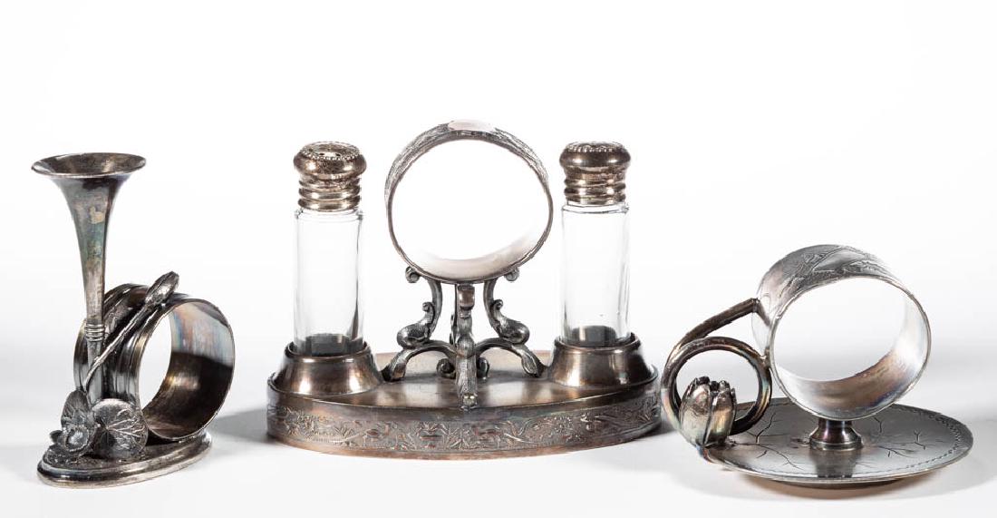 SIMPSON, HALL, MILLER & CO. AND OTHER FIGURAL: SIMPSON, HALL, MILLER & CO. AND OTHER FIGURAL SILVER-PLATED ARTICLES, LOT OF THREE, comprising a "04" lily pad napkin ring and a napkin ring and shaker combination set by Simpson, Hall, Miller & Co.,