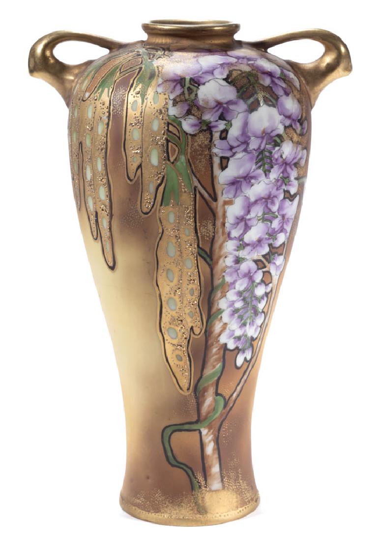 NIPPON PORCELAIN WISTERIA VASE: NIPPON PORCELAIN WISTERIA VASE, having a tapered form, flared foot and rim, two molded shoulder handles, and hand-painted polychrome wisteria floral and leaf design on olive ground with gilt decoratio