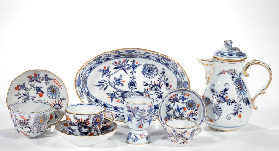 GERMAN MEISSEN PORCELAIN "RICH BLUE ONION" ARTICLES,: GERMAN MEISSEN PORCELAIN "RICH BLUE ONION" ARTICLES, LOT OF NINE, comprising a covered teapot, a demitasse cup, a 4" D circular dish, a egg cup, a oval scalloped rim dish, and two scalloped rim cup an