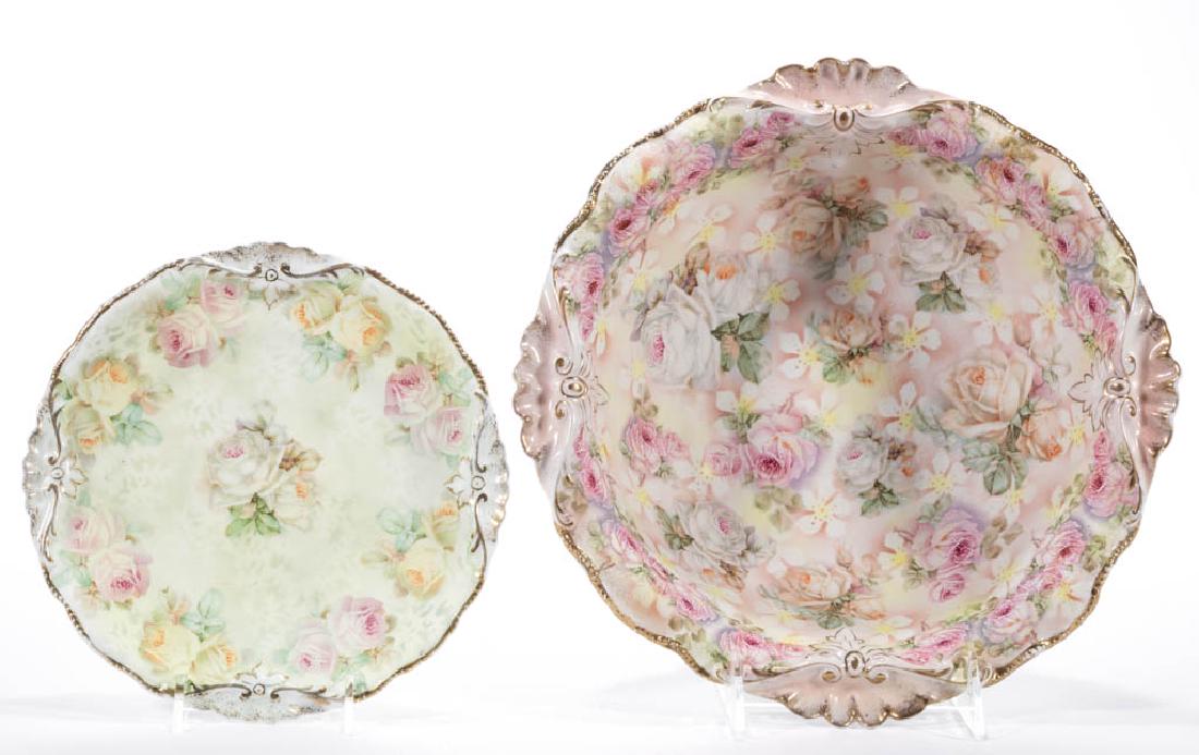 GERMAN ROYAL BAYREUTH TAPESTRY PORCELAIN TABLE: GERMAN ROYAL BAYREUTH TAPESTRY PORCELAIN TABLE ARTICLES, LOT OF TWO, comprising a plate having "White Rose" pattern and a bowl having "Rose and Daisy" pattern, each with shell and leaf molded rims and