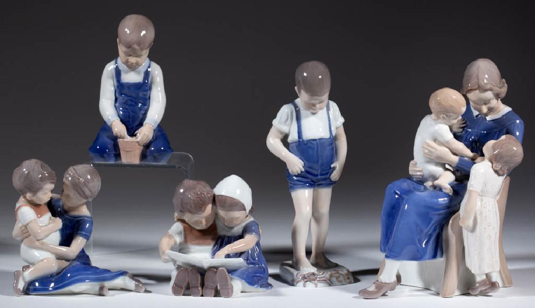 DANISH BING & GRONDAHL PORCELAIN HAND-PAINTED FIGURES,: DANISH BING & GRONDAHL PORCELAIN HAND-PAINTED FIGURES, LOT OF FIVE, comprising children in various poses including boys at the beach (#1870 and #2127), reading (#1567), conversing (#1568), and sitting