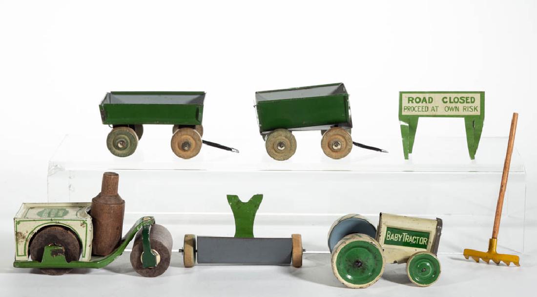 ANTIQUE / VINTAGE TIN FARMING TOYS, LOT OF SEVEN: ANTIQUE / VINTAGE TIN FARMING TOYS, LOT OF SEVEN, comprising a "Baby Tractor" and a "Baby Steam Roller" by Animate Toys, three loading/trailer attachments, a "Road Closed" sign, and a rake with wooden