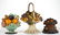 CAST-IRON FIGURAL FRUIT DOORSTOPS, LOT OF THREE